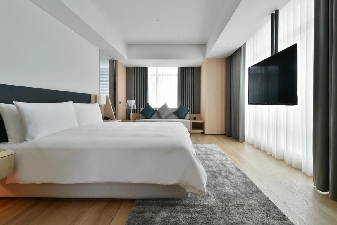 Silks Club Hotel Kaohsiung Buitenkant foto Deluxe Room